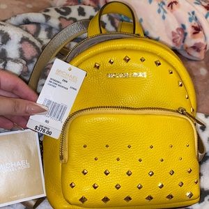 Small yellow mk bookbag